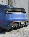 2026+ | Model Y Juniper Refreshed Colossal Full Body Kit - Real Dry Molded Carbon Fiber (4 Pieces)