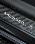 2024+ | Model 3 Highland Refreshed Door Sill Overlays (4 Pieces) - Real Dry Molded Carbon Fiber