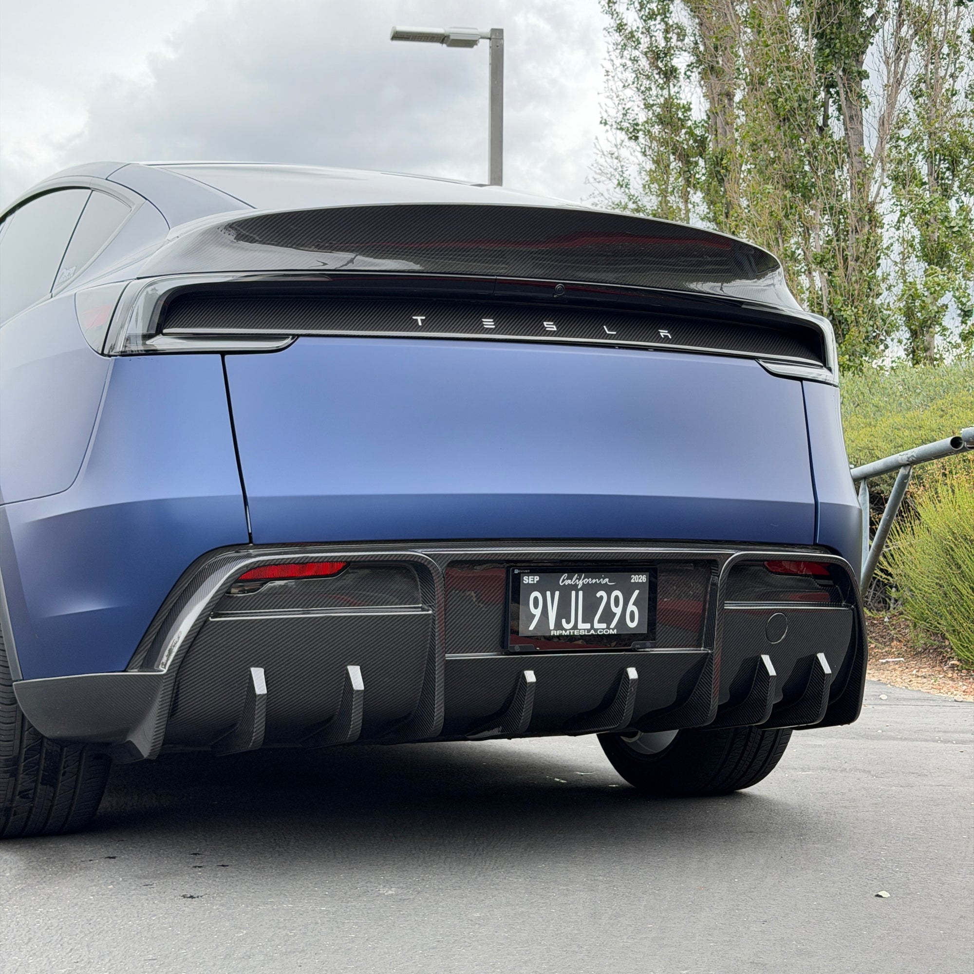 2026+ | Model Y Juniper Refreshed Colossal Full Body Kit - Real Dry Molded Carbon Fiber (4 Pieces)