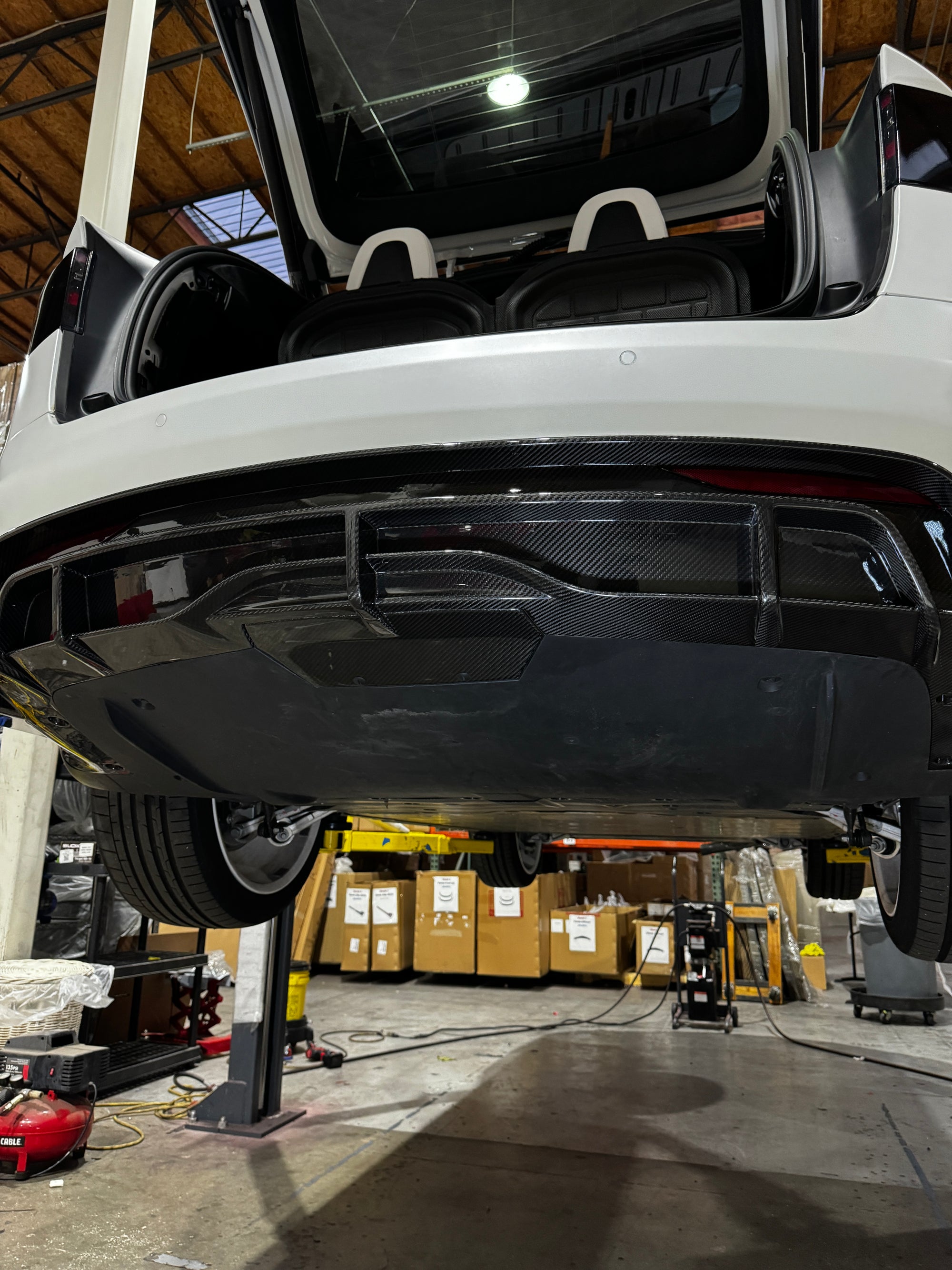 2022+ | Model X Colossal Rear Replacement Diffuser - Real Dry Molded Carbon Fiber