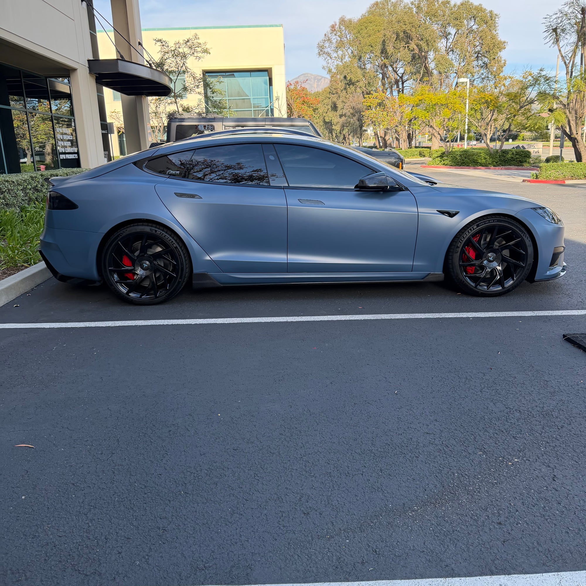 2021+ | Model S Colossal Delfino Side Skirts (1 Pair) - Real Dry Molded Carbon Fiber