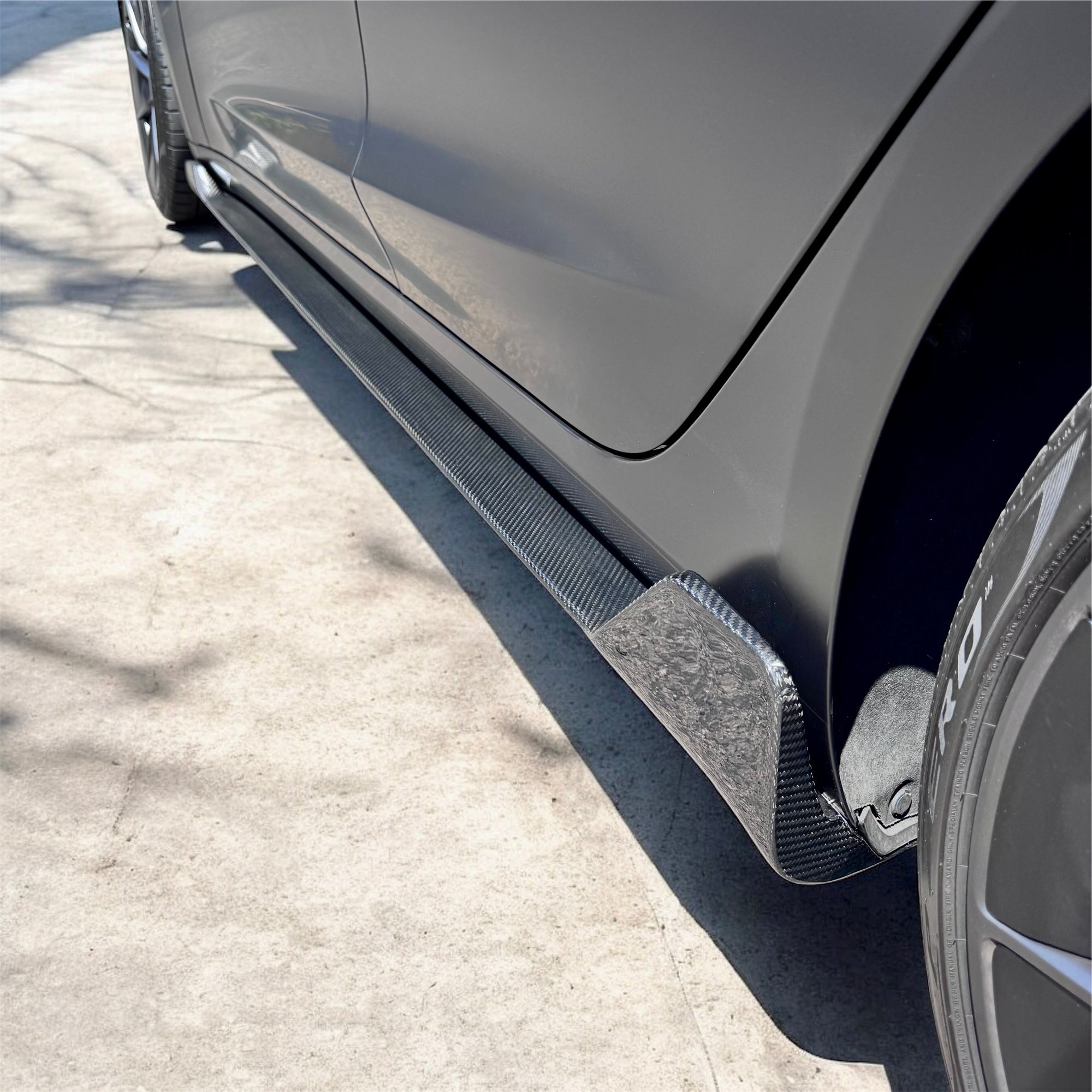 2017+ | Model 3 Colossal Side Skirt Overlays - Real Dry Molded Carbon Fiber