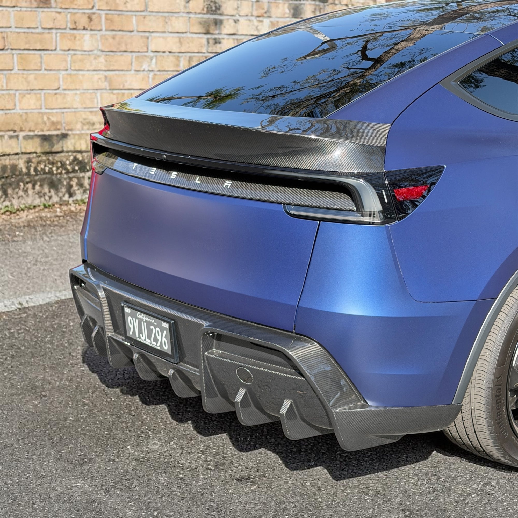 2026+ | Model Y Juniper Refreshed Colossal Full Body Kit - Real Dry Molded Carbon Fiber (4 Pieces)