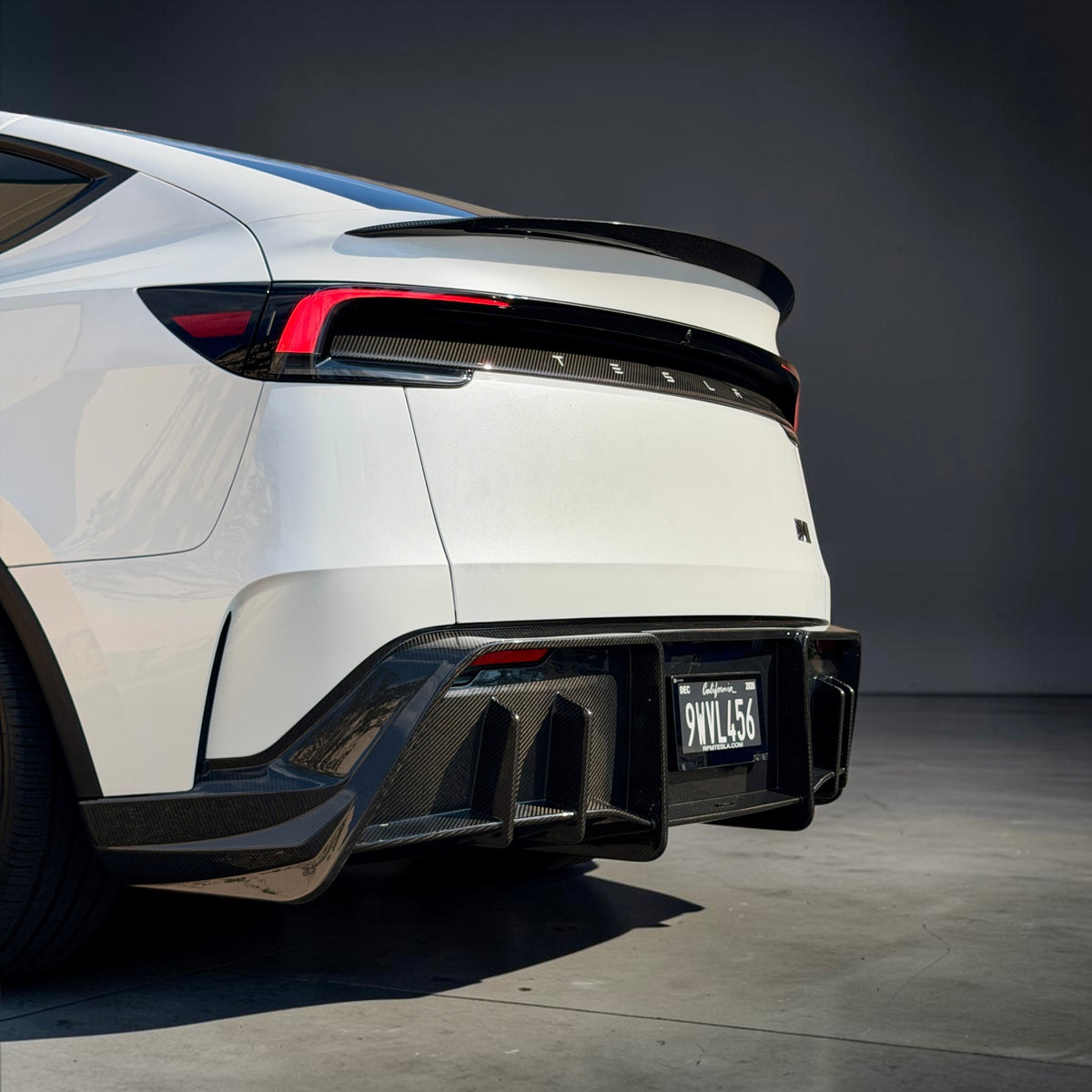 2026+ | Model Y Juniper Performance Model Colossal Full Rear Diffuser Replacement - Real Dry Molded Carbon Fiber