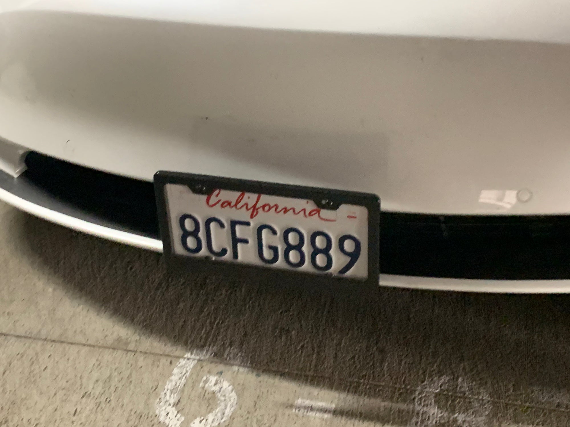 Model 3 &amp; Y License Plate Lowering Bracket - Touchless